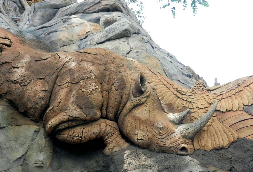 a rhinoceros carved into a rock