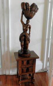 wood carving of african woman