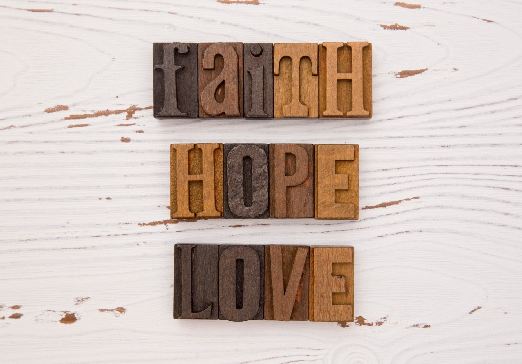 FAITH, HOPE, LOVE in wooden block letters