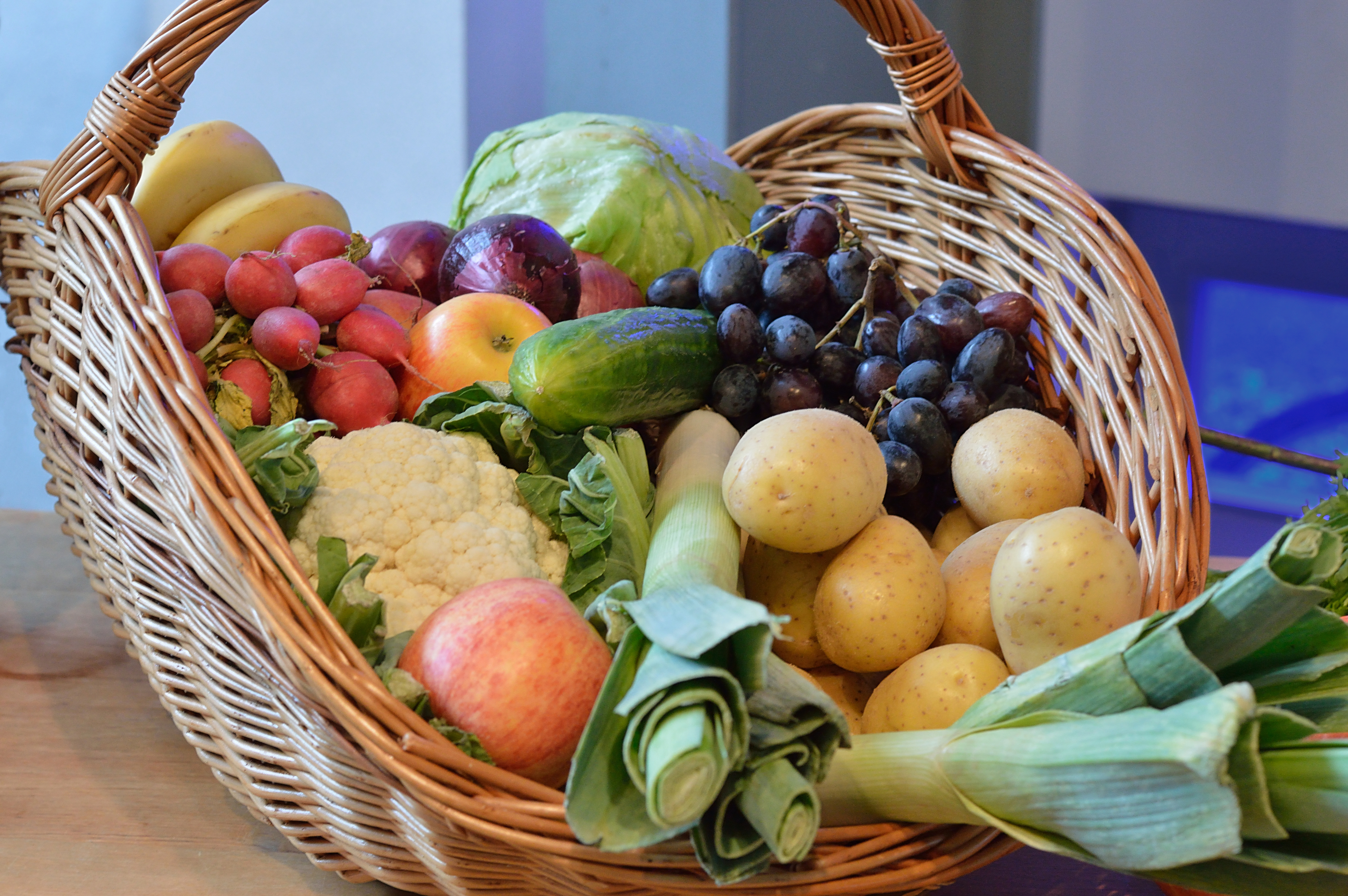 a basket filled with fruits and vegetables